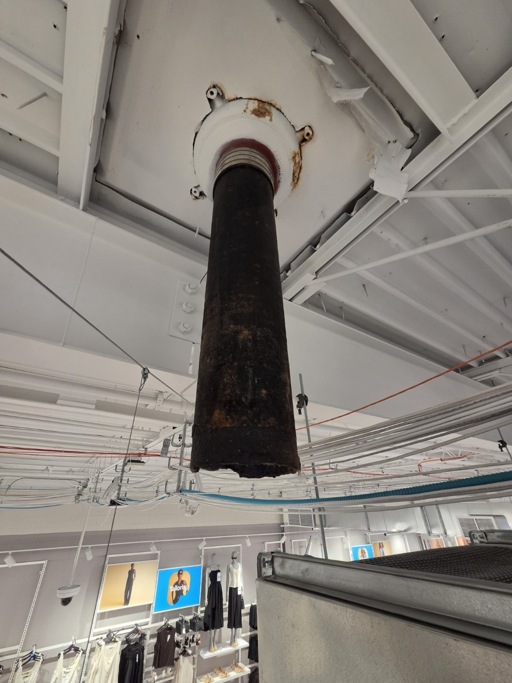 Overhead drain repair in progress