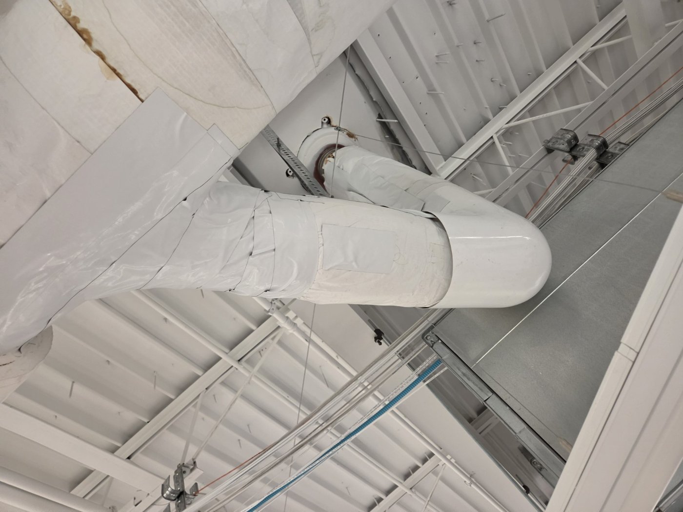 Insulated overhead drain piping