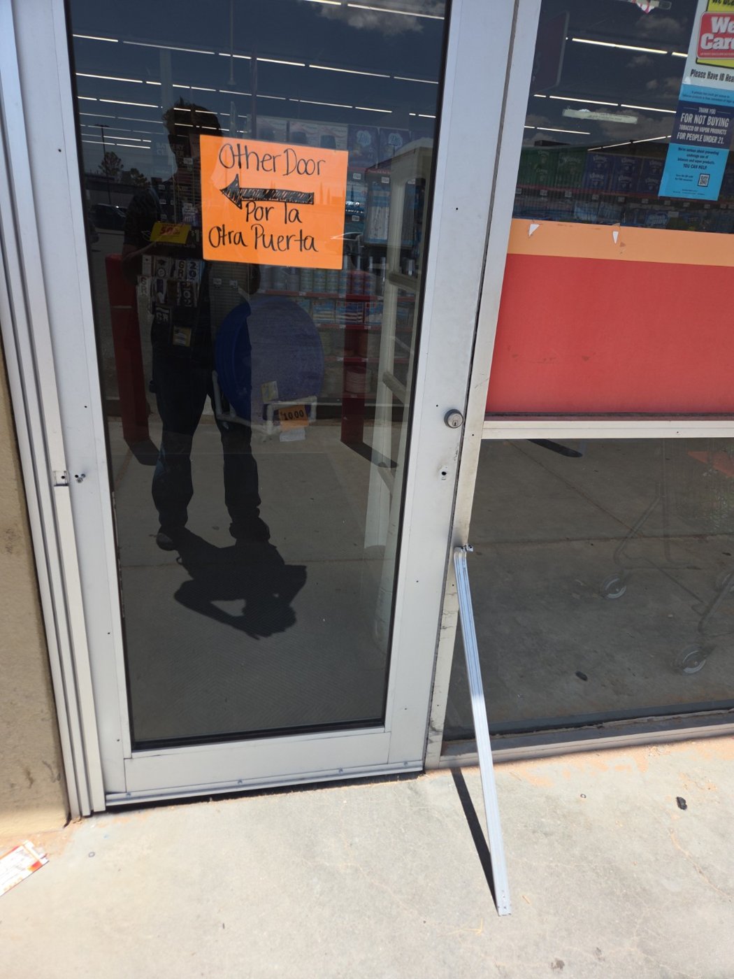 Commercial door repair in progress